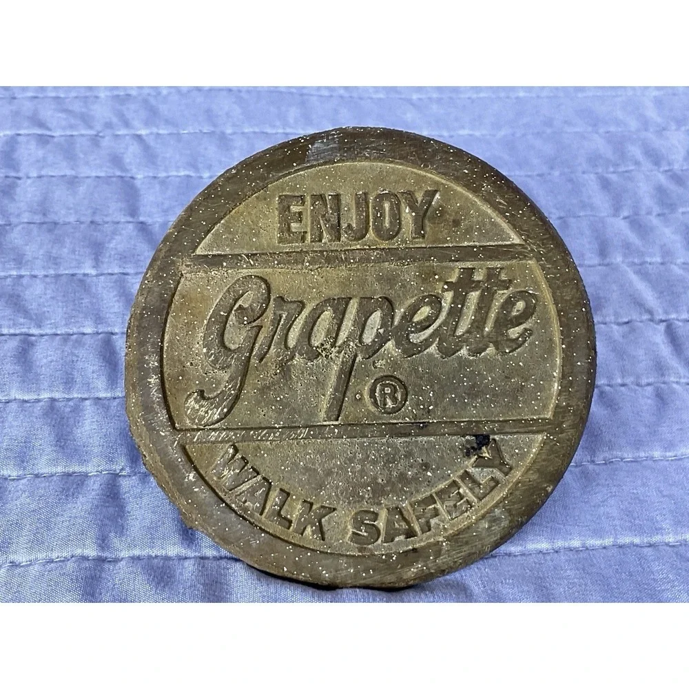 Vintage Enjoy Grapette Soda Sidewalk Marker Safety First Advertising Cast Iron